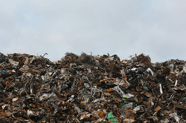Piles of landfill waste that can be reduced by using recycled car parts